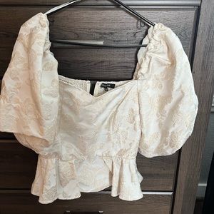 White. Peplum top. Size medium.
